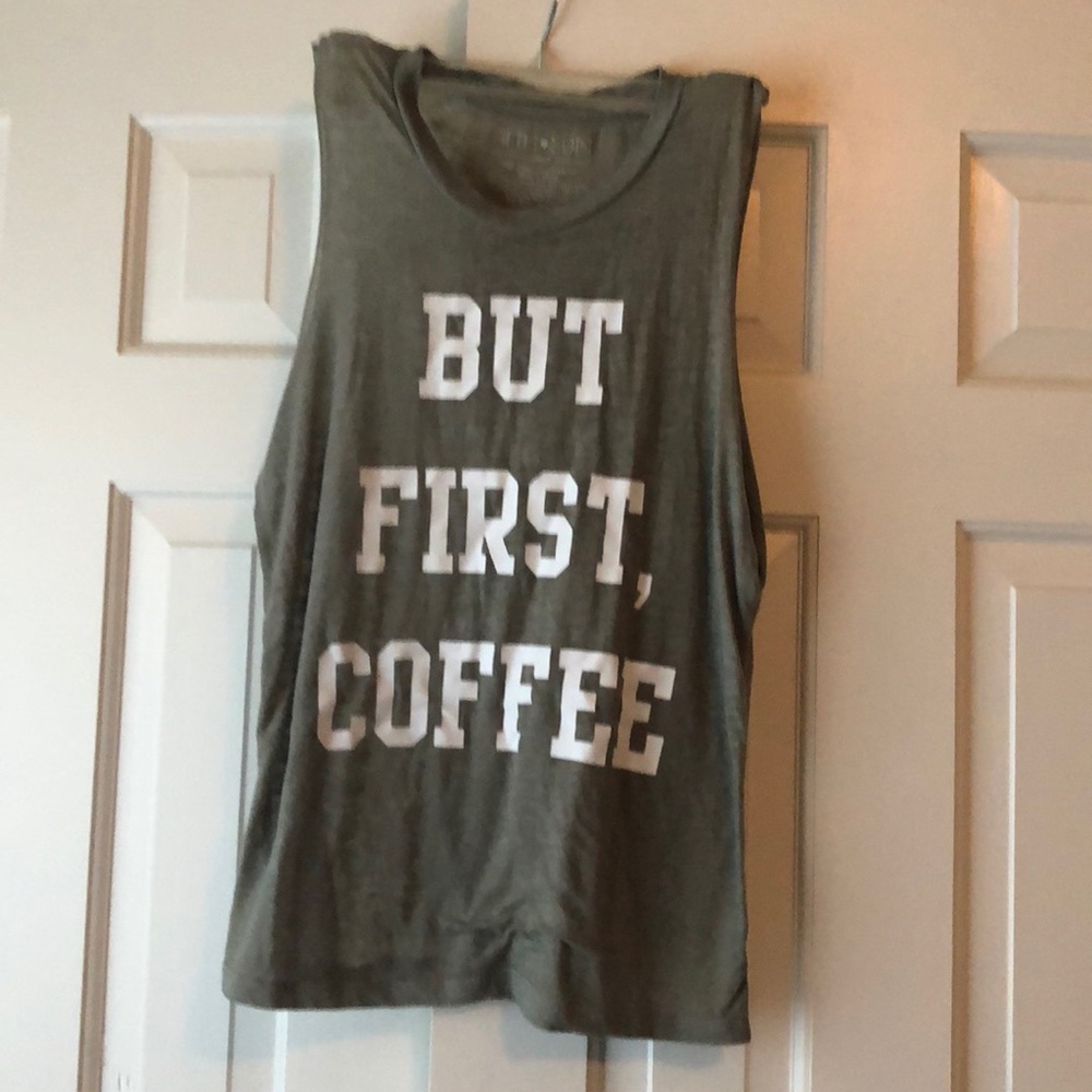 Muted free tank top with white lettering